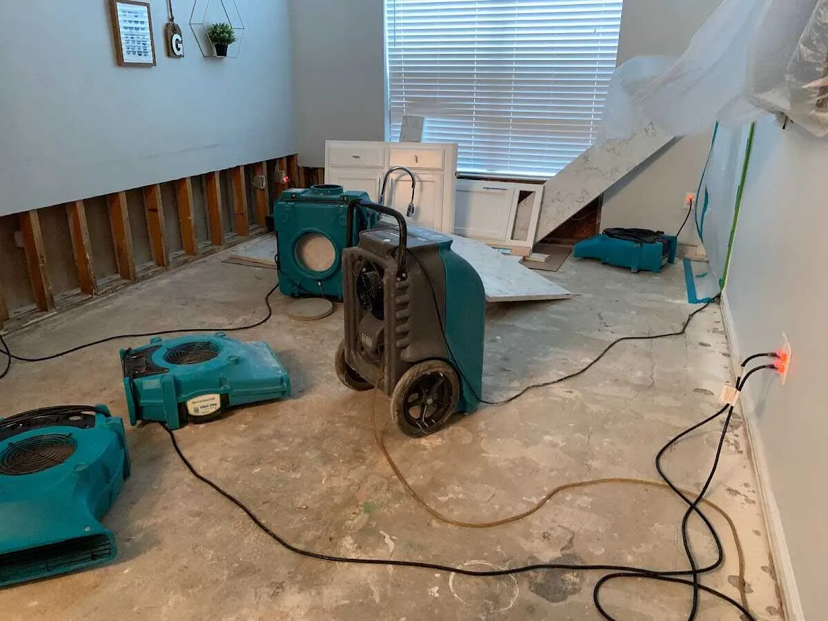 Dehumidifier in flood-cut room for Water Damage Restoration in Lochearn